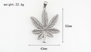 Detailed specs of maple leaf pendant in vintage steel, sized 52mm by 43mm and 22.6g weight