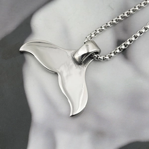 Polished silver whale tail pendant on a box chain for men and women's fashion