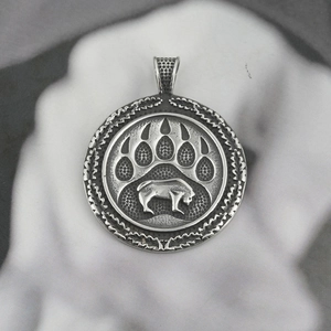 Vintage silver titanium steel necklace featuring a Viking Celtic bear paw print pendant