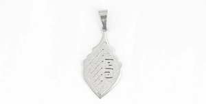 Detail of matte silver titanium steel pendant with geometric texture and polished lines