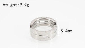 Detail of silver titanium steel ring with three-layer design and Forever engraving