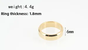 Detail view of 6mm gold stainless steel ring showing 1.8mm thickness and 4.4g weight