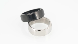 Polished silver and black geometric titanium rings with minimalist flat top design