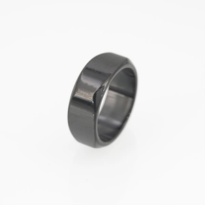 Polished black geometric faceted stainless steel ring for men with modern edgy design