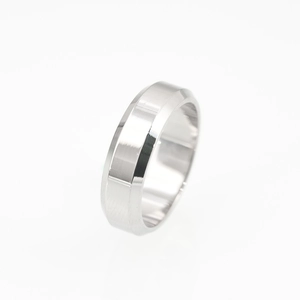 Minimalist silver titanium steel ring with geometric beveled edges and polished finish