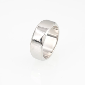 Minimalist wide silver stainless steel band ring with polished metallic finish