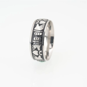 Men's wide silver titanium steel ring featuring black engraved peace dove and heart patterns