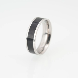 Polished silver stainless steel ring featuring a black ceramic center inlay for couples