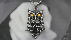 Gothic owl skull pendant with yellow gem eyes and vintage stainless steel finish detail