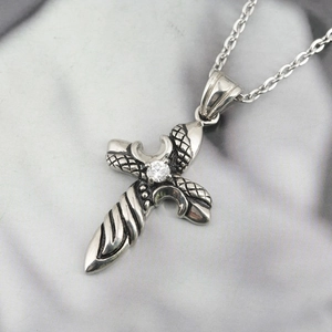 Vintage stainless steel cross necklace with center zircon stone and snake skin texture