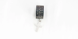 Detail of silver stainless steel ring with Spanish prayer text and cross charm