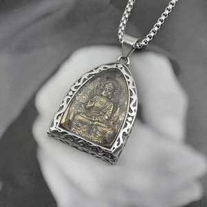 Retro titanium steel Buddha pendant necklace with silver hollow frame and gold deity relief