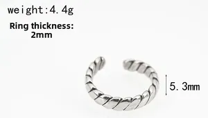 Detail view of silver twisted rope ring showing 2mm thickness and 5.3mm width measurements