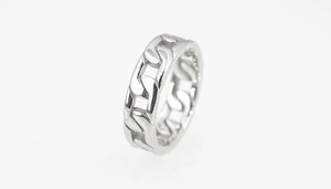 Detailed close-up of a silver Cuban link chain ring with a high-polished stainless steel finish