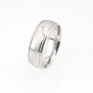 Mens wide stainless steel ring featuring vintage vine pattern and polished silver finish