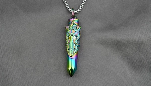 Macro view of rainbow plating bullet pendant with silver hollow shield metal detail