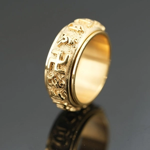 Golden titanium steel spinner ring with engraved Buddhist mantras and rotary design