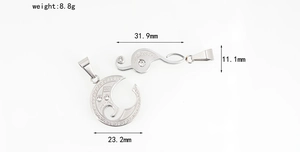 Detailed view of musical note pendants with crystal inlay and specific dimensions