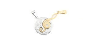 Detailed view of silver disk with Love you text and gold G-clef musical pendant
