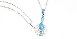 Detail of silver and blue musical note necklaces with I love you engraving and zircons