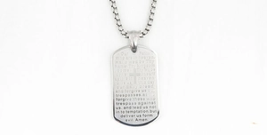 Detail of laser engraved Lord's Prayer and cross on silver stainless steel dog tag necklace