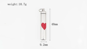 Polished steel cylinder pendant with red heart, dimensions 48mm by 9.2mm, weight 10.7g