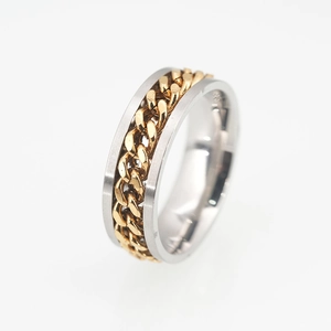 Polished silver stainless steel spinner ring with a golden curb chain inlay for men