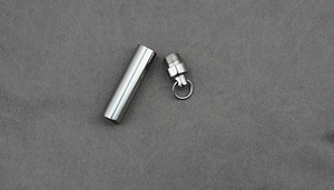 Polished stainless steel cylinder urn pendant with secure screw top for ashes or perfume