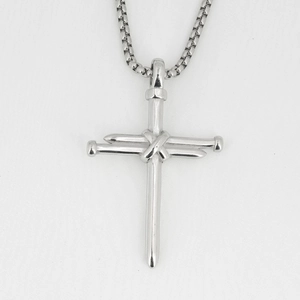 Titanium steel cross necklace featuring a unique nail-style design with a box chain