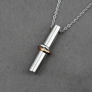 Polished stainless steel cylinder urn necklace with silver and rose gold rings decoration
