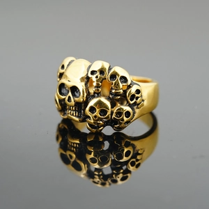Bague tête de mort punk en acier inoxydable doré avec des gravures gothiques audacieuses
