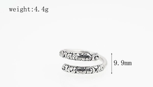 Macro detail of retro monkey king ring showing 9.9mm width, 4.4g weight and engravings