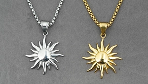Detailed macro view of retro 316L stainless steel sun flower pendants in silver and gold