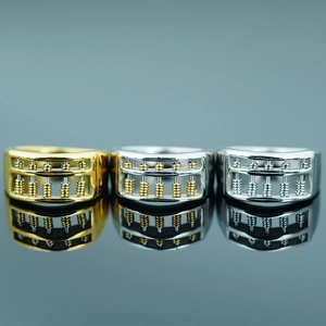 Titanium steel abacus rings in gold and silver finishes with movable beads on reflective base