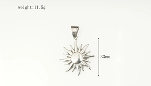 Detail view of 33mm sunflower pendant in vintage stainless steel showing 11.5g weight info