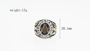 Macro shot of vintage Freemason Master Mason ring in silver and gold dual-tone finish
