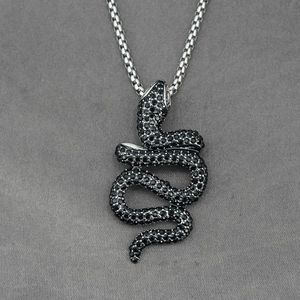Sparkling silver rattlesnake pendant necklace featuring micro-pave black zircon stones