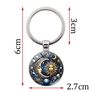 Vintage celestial sun and moon keychain with silver metal ring and 2.7cm glass pendant