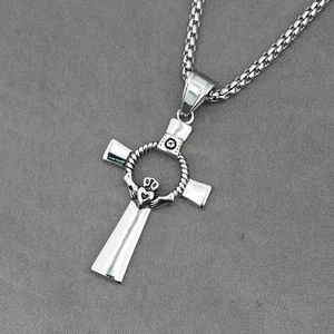 Silver Celtic Claddagh cross pendant necklace in stainless steel with wheat chain detail