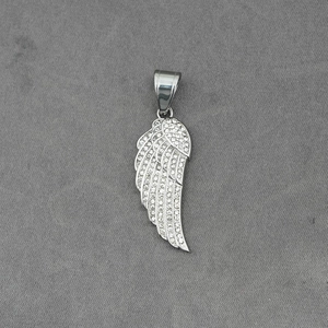 Elegant silver angel wing pendant with shimmering crystals on a textured background
