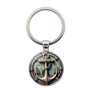 Vintage nautical anchor keychain with a bronze embossed pendant on a white background