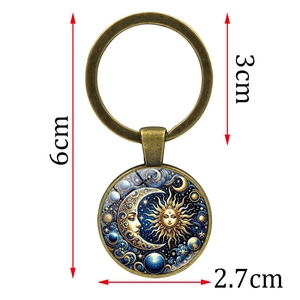 Vintage celestial sun and moon keychain with 6cm total length and bronze metal finish