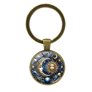 Vintage bronze sun and moon keychain with celestial art glass cabochon pendant