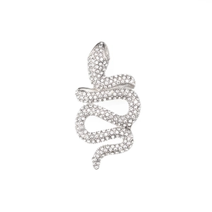 Sparkling silver diamond rattlesnake pendant necklace with white crystals on white background