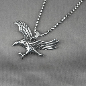 Vintage stainless steel eagle pendant necklace with detailed feathers and silver box chain