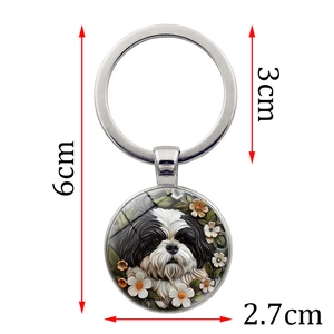 Silver metal Shih Tzu puppy keychain with floral illustration and size dimensions