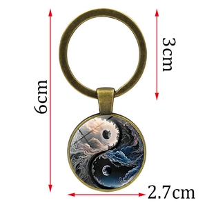 Vintage bronze Yin Yang Tai Chi keychain with celestial moon pendant and size markers