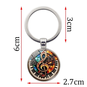 Music themed keychain with G-clef piano pattern and colorful stained glass art style