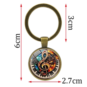 Creative music note keychain with treble clef and piano key design in bronze finish