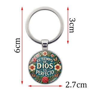 Porte-clés en métal argenté avec pendentif rond, texte espagnol et motifs de fleurs